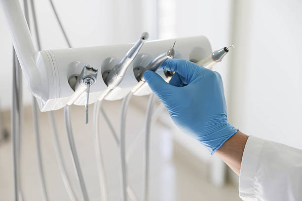 Professional Teeth Whitening technician working in Great Neck Plaza, NY